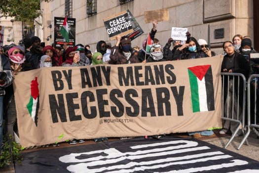 Students participate in a protest in support of Palestine and for free speech outside of the Columbia University campus on November 15, 2023 in New York City. (Photo by Spencer Platt/Getty Images)