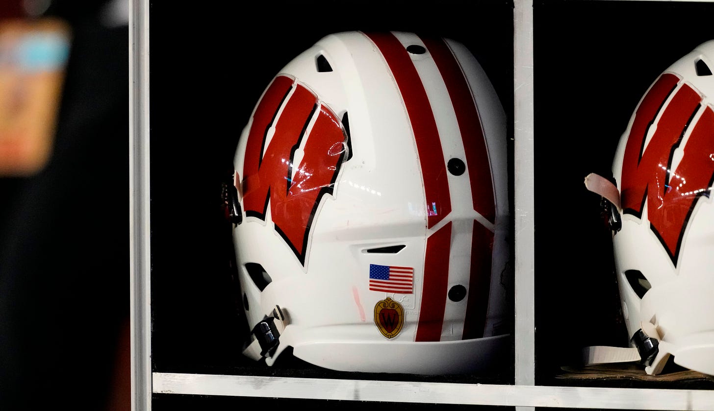 General view of a Wisconsin Badgers football helmet on the sidelines at Camp Randall Stadium
