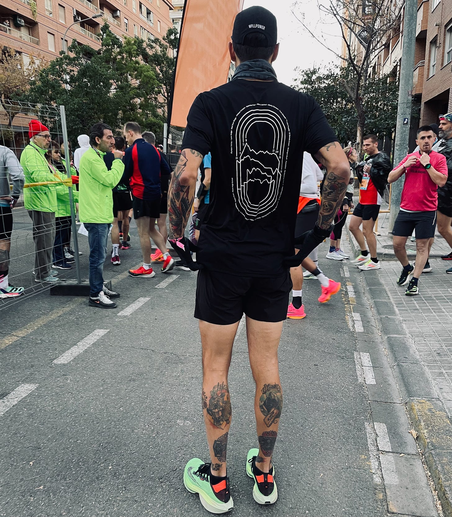 the author standing in the start block of the valencia marathon back view