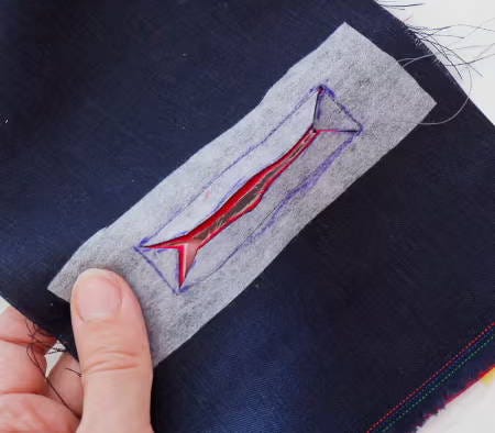 Stitching on the rectangular shape through all 3 layers