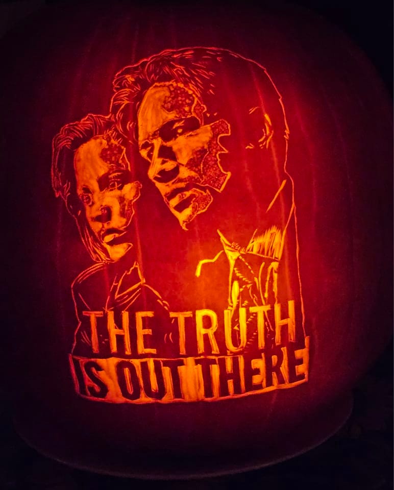 Pumpkin carved with Mulder and Scully from The Xfiles with The truth is out there.