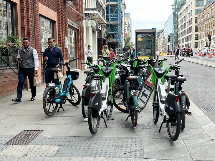 Some bikes falling onto a cycle lane