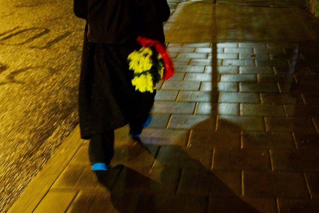 blue shoes and flowers at night Sydenham