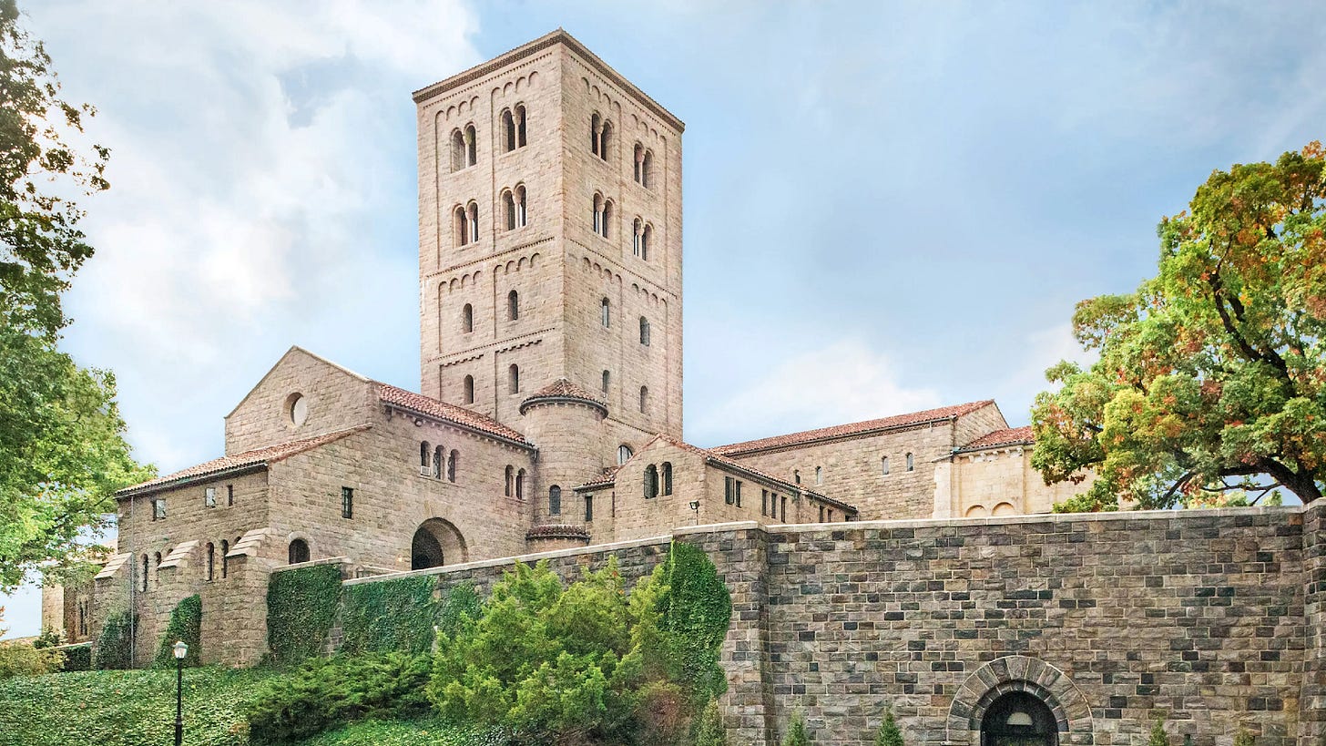 A stone building with The Cloisters

Description automatically generated