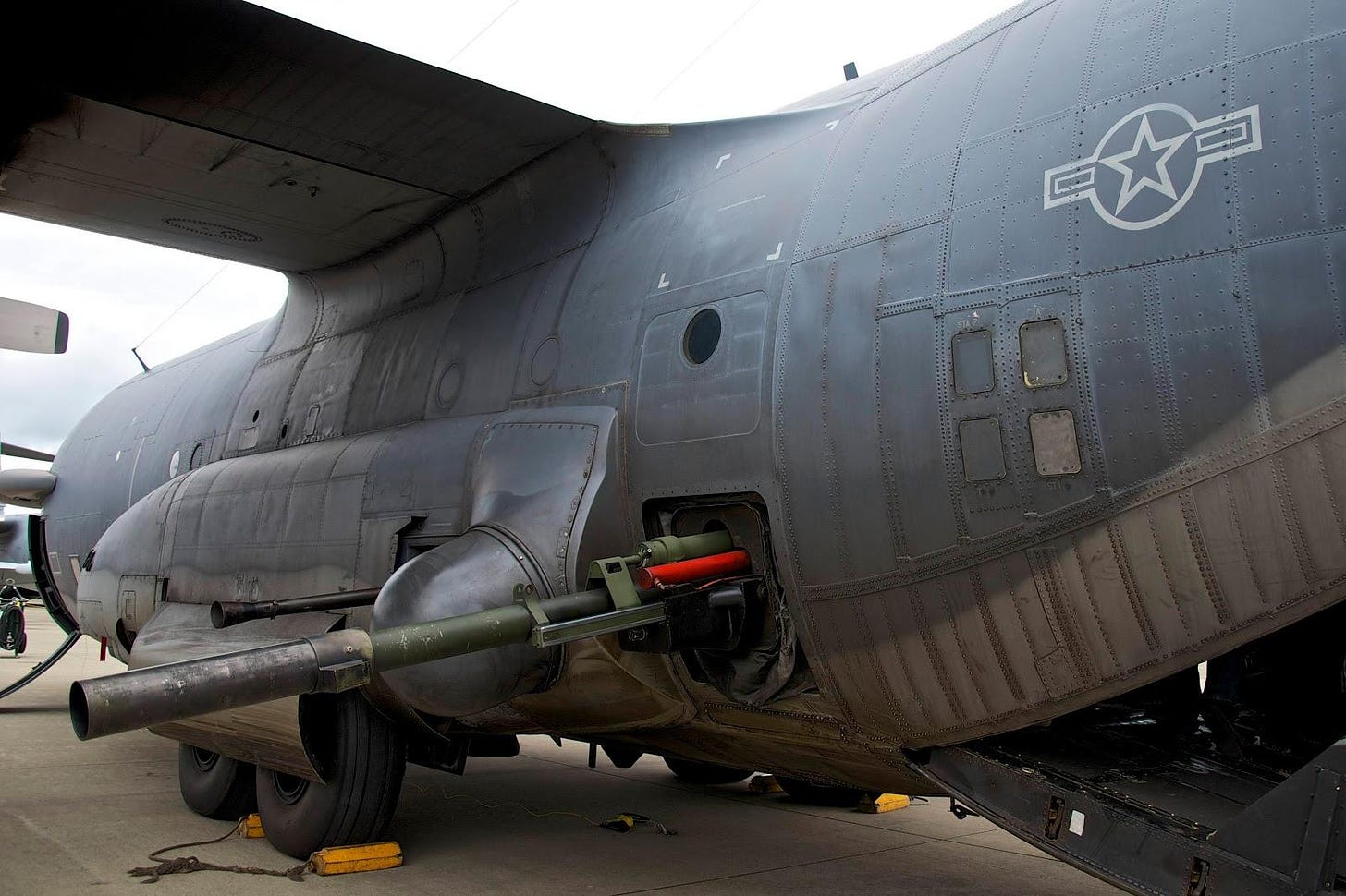 This is the 105mm Howitzer cannon on a Lockheed AC-130 gunship. Its recoil  has enough force to bench press over 20,000 lbs : r/pics