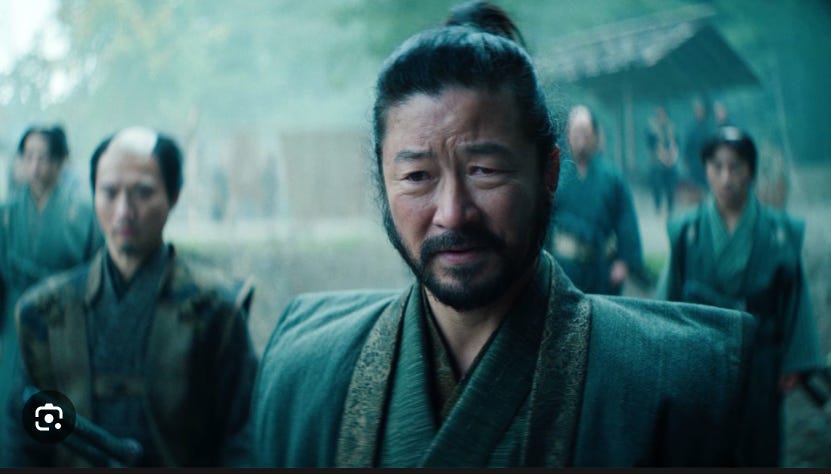 Actor Tadanobu Asano as Yabushige with a very confused expression on his face