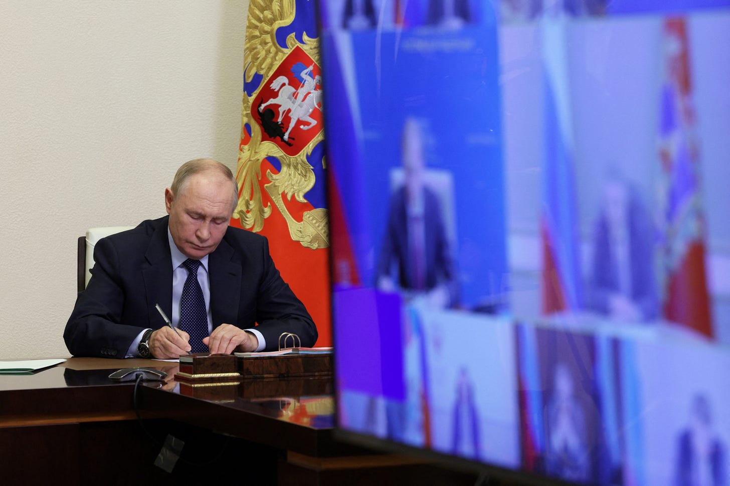 Russian President Putin chairs a meeting outside Moscow