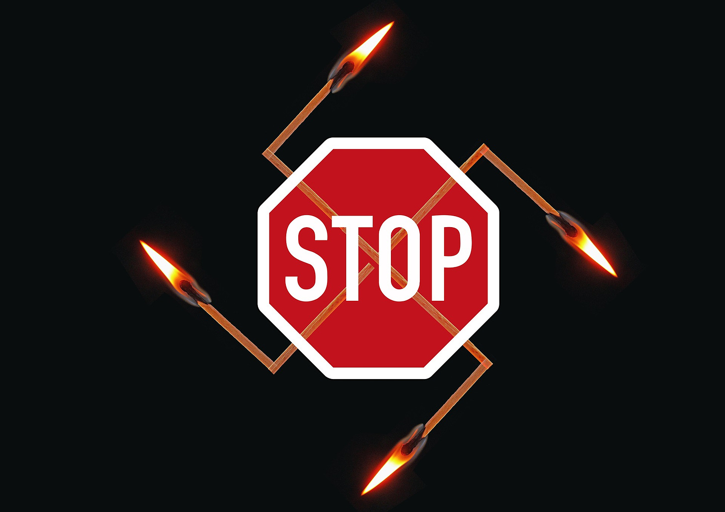 Burning swastika with STOP sign superimposed