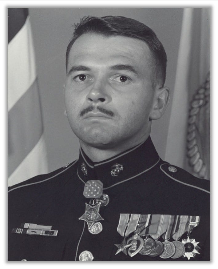 Headshot of Kellogg, in uniform.  The Medal of Honor hangs around his neck.