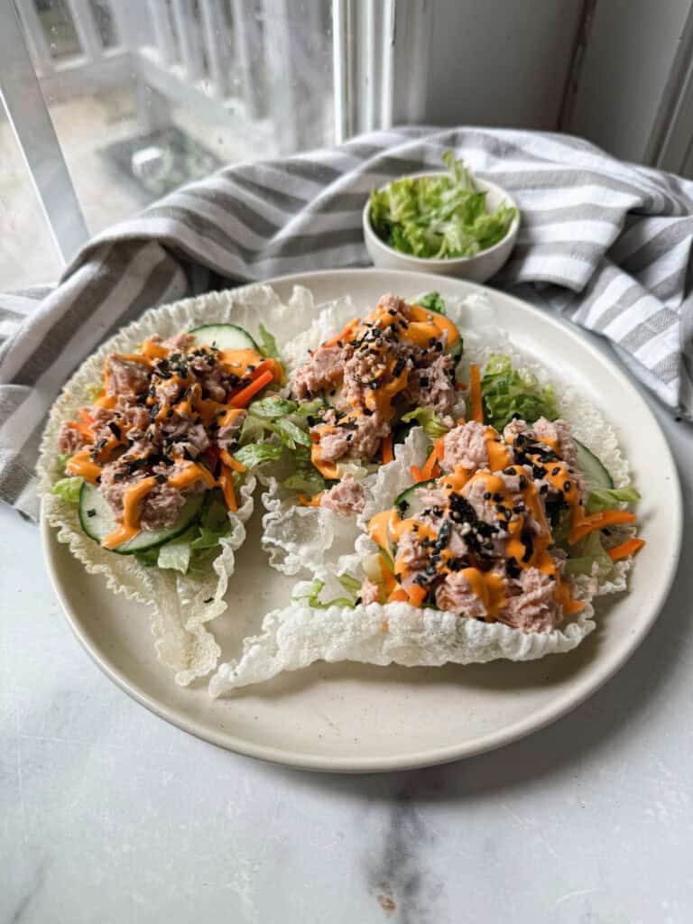 Spicy Tuna Rice Paper tacos on a white plate.