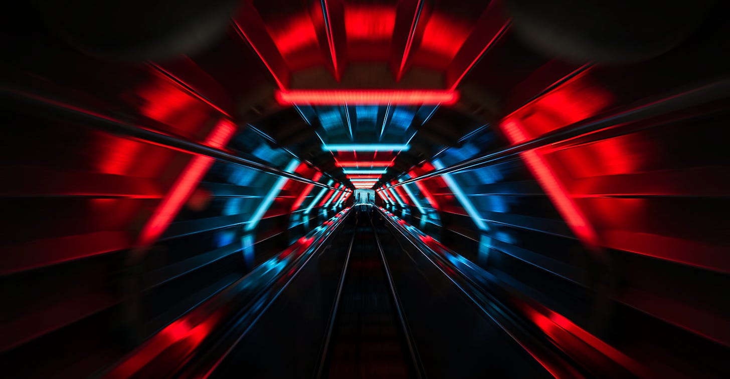 dark collider tunnel with red and blue neon lights