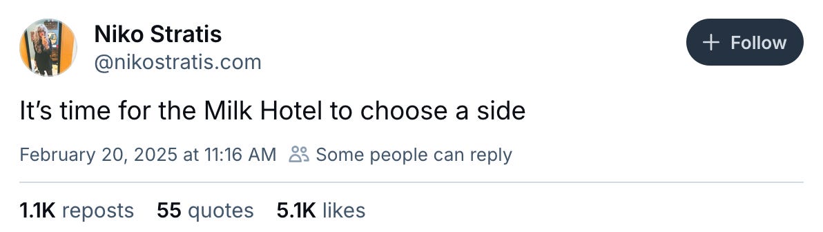February 20, 2025 Bluesky post by Niko Stratis reading, "It’s time for the Milk Hotel to choose a side"