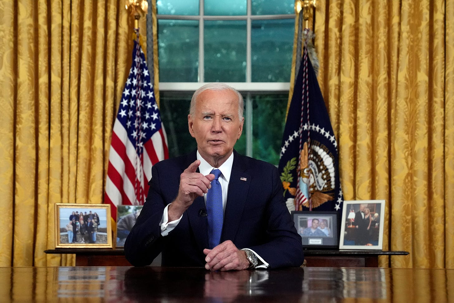 Biden says he's 'passing the torch' to defend democracy in speech from Oval  Office | Reuters