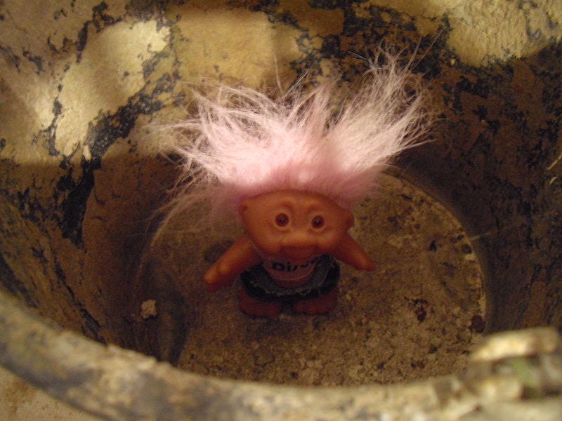 File:Crusty old bucket with a troll in it.JPG