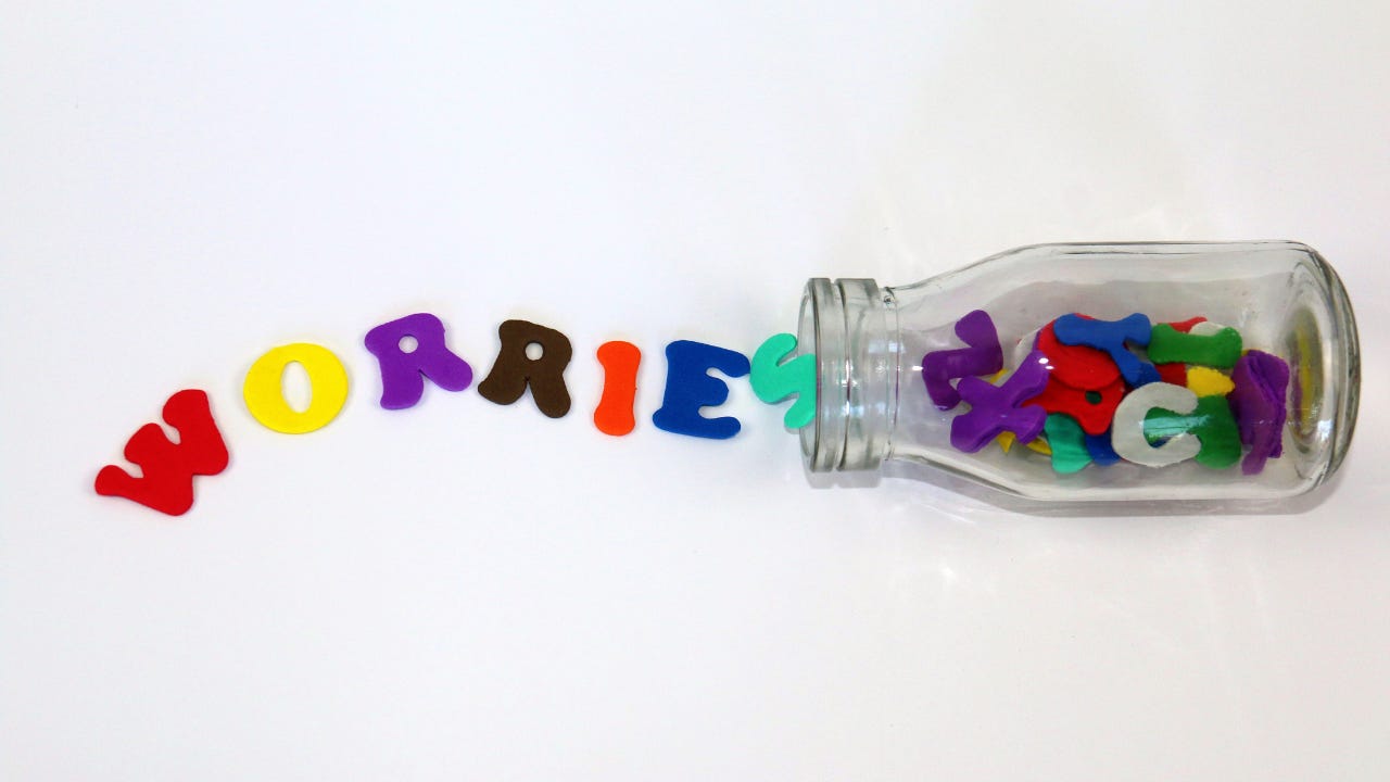 The word "worries" spelled out from colorful letters. 