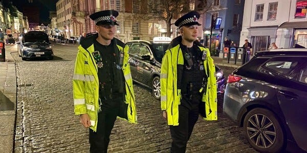 Two officers on patrol at the taxi rank in Colchester Town Centre