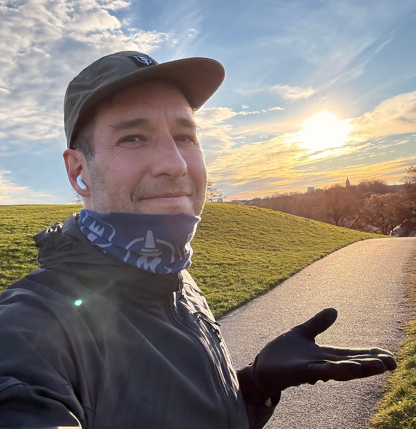 The author smiling on top of the Olympic Hill in Munich