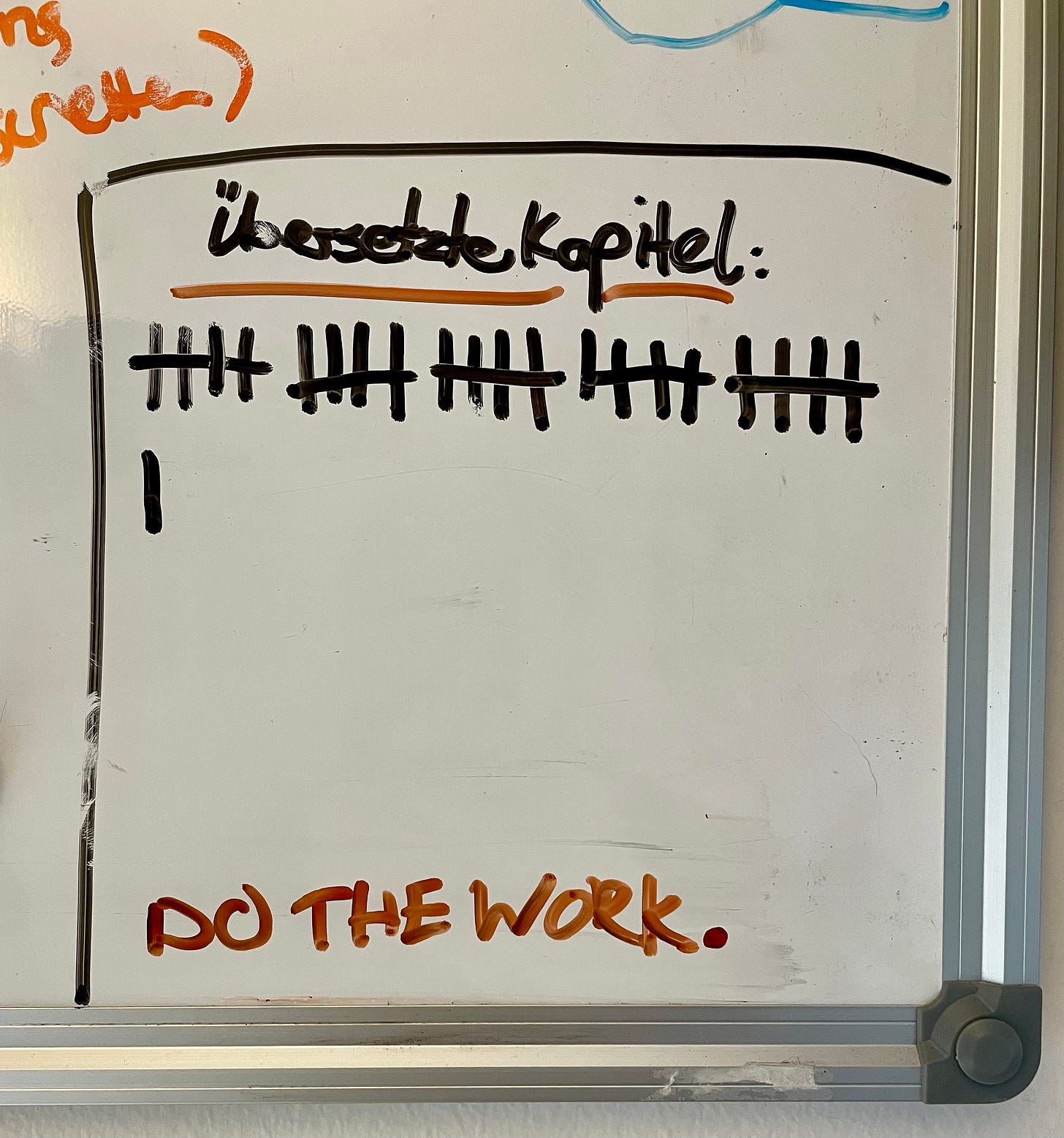 Whiteboard scribble, counting the translated chapters of "Runhundred" and a motivational sentence saying "Do the work!"