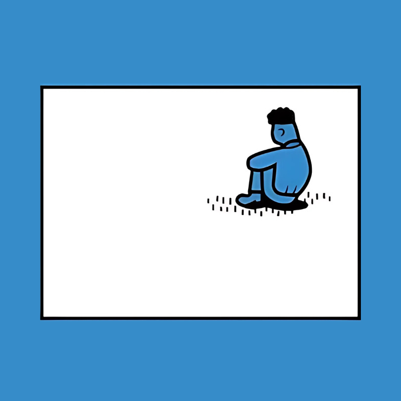 Cartoon of a blue figure sitting alone on the ground with arms wrapped around knees, facing away. The figure is placed in an empty white space with a blue border.