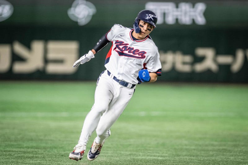 South Korea's Lee Jung-hoo runs to the third base during the World Baseball Classic (WBC) Pool B round game between Czech Republic and South Korea at the Tokyo Dome in Tokyo on March 12, 2023. (Photo by Yuichi YAMAZAKI / AFP) (Photo by YUICHI YAMAZAKI/AFP via Getty Images)