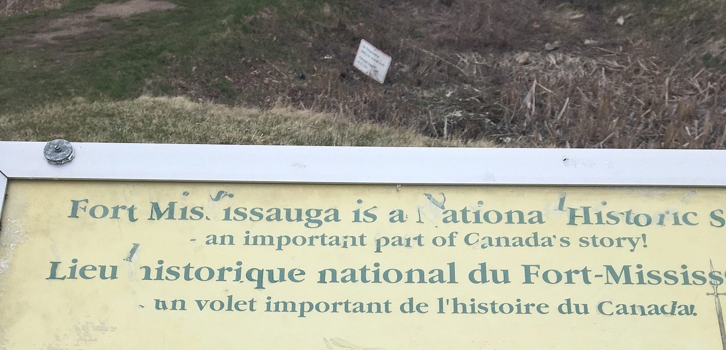 Peeling text on a plaque that once read Fort Mississauga is a National Historic Site - an important part of Canada's story!