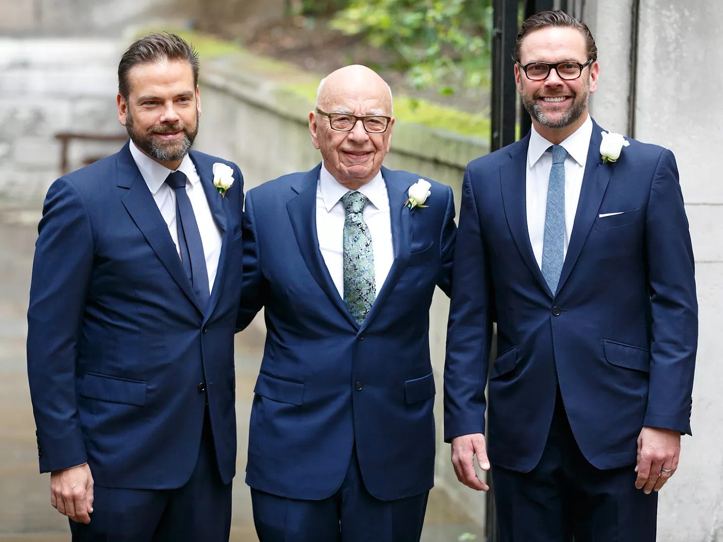 Rupert Murdoch with his sons Lachlan Murdoch (L) and James Murdoch (R) arrives at St Bride's Church for a service to celebrate his marriage to Jerry Hall on March 5, 2016 in London, England