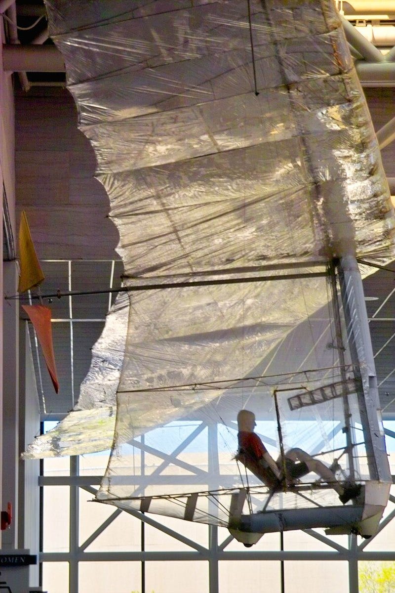 A large airplane in a museum