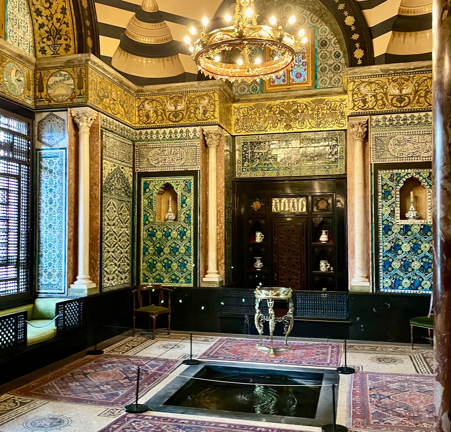 The dazzling Arab Hall with pool and tiles