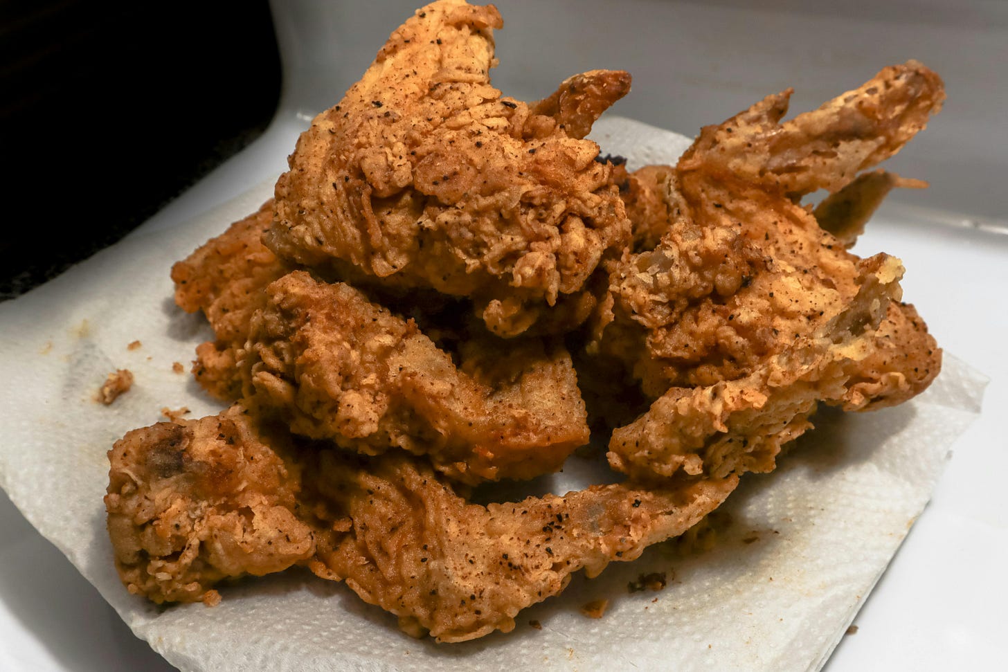 Fried Chicken on Paper Towel · Free Stock Photo