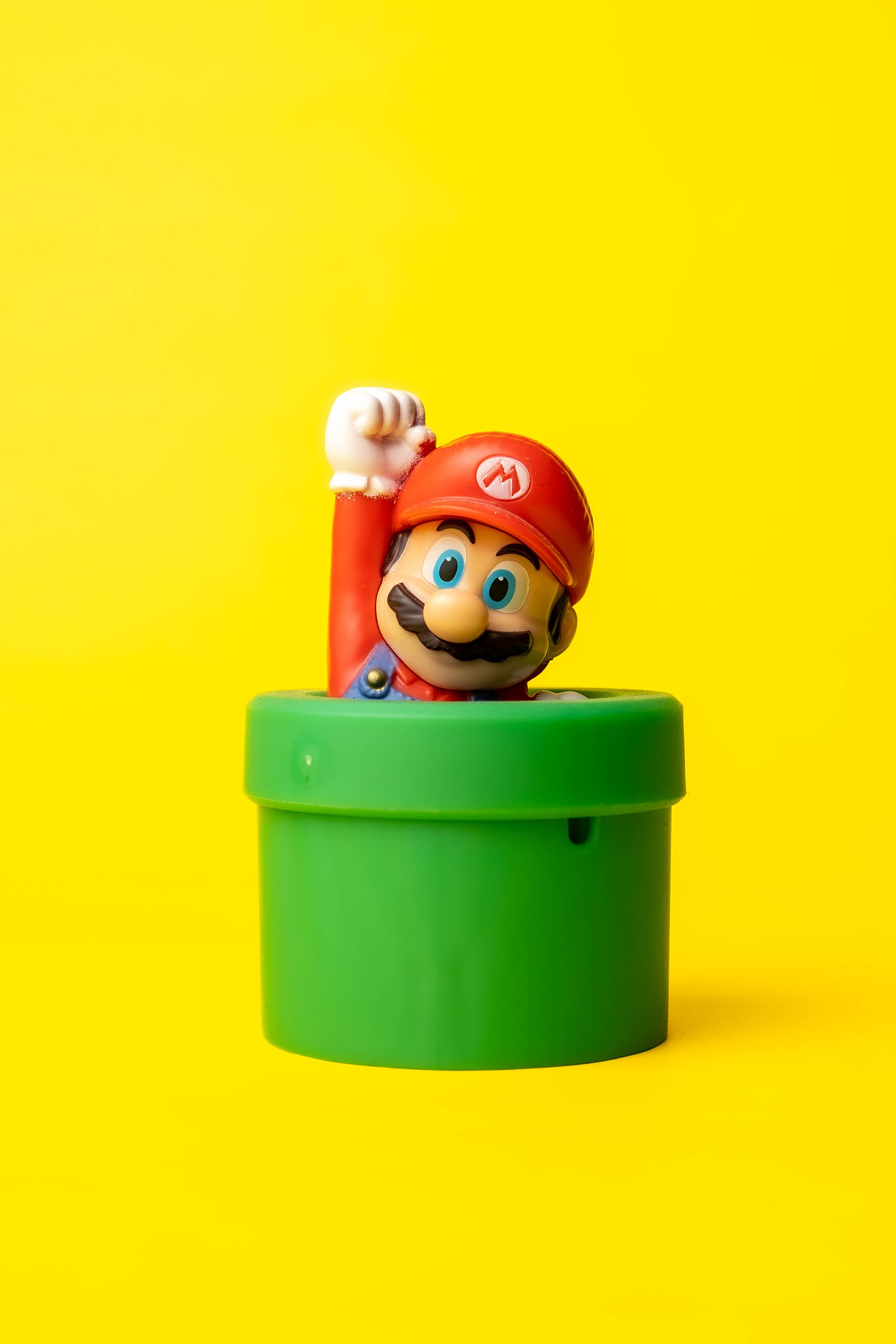 An image of Super Mario popping out of a pipe
