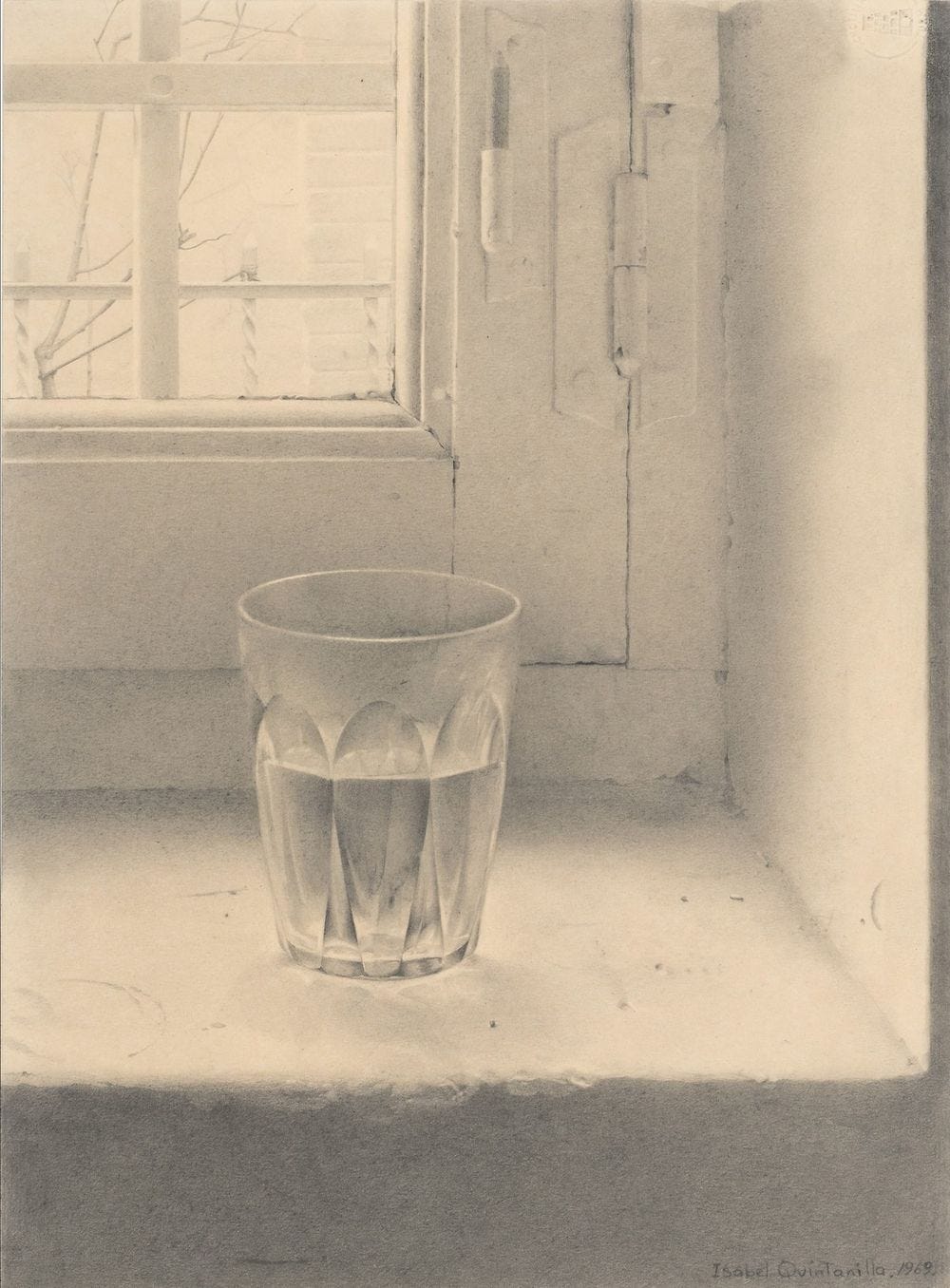 A glass tumbler containing water sits on a window sill.