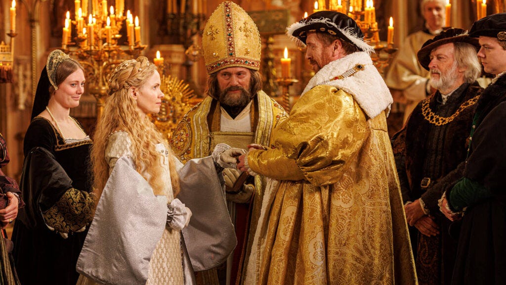 A scene from the historical drama Wolf Hall: The Mirror and the Light on PBS MASTERPIECE where Jane Seymour (Kate Phillips) is being wed to King Henry VIII (Damian Lewis).