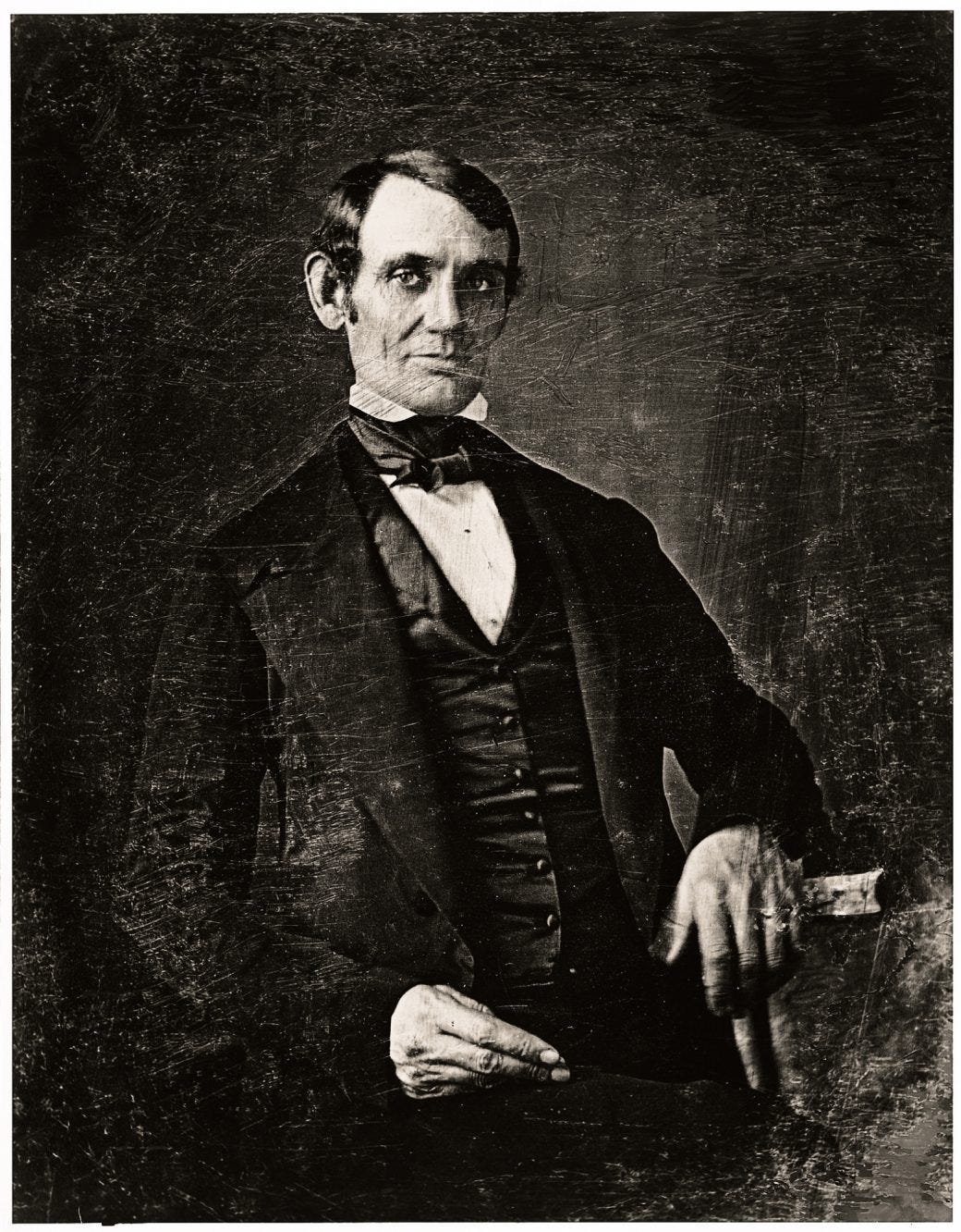 Shepherd, Nicholas H, photographer. Abraham Lincoln, Congressman-elect from Illinois. Three-quarter length portrait, seated, facing front. , 1846. [Springfield, Ill., or 1847] Photograph. https://www.loc.gov/item/2004664400/.