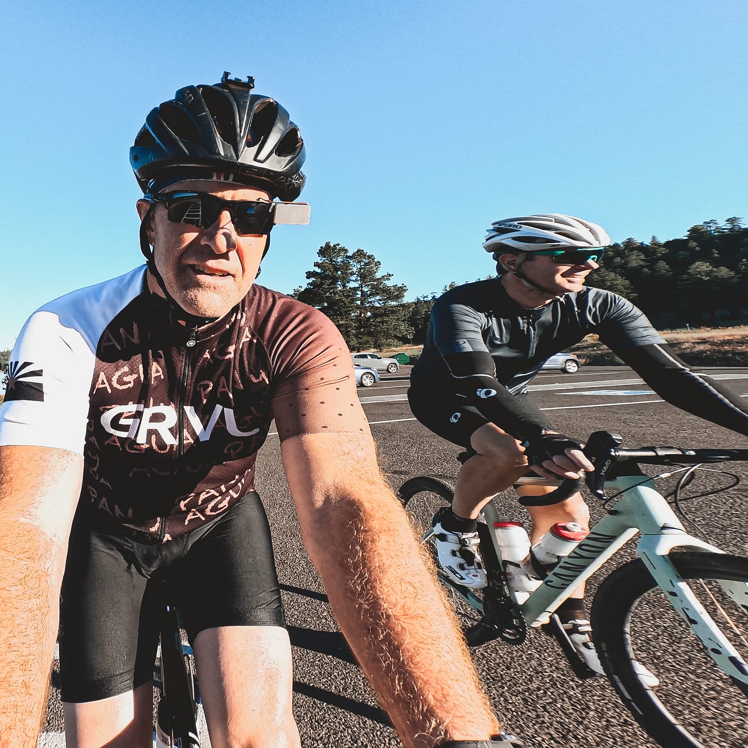 Two cyclists, Sean Openshaw and Kris Estes, head out on their bikes for a ride along Lake Mary. Two cyclists, Sean Openshaw and Kris Estes, head out on their bikes for a ride along Lake Mary.
