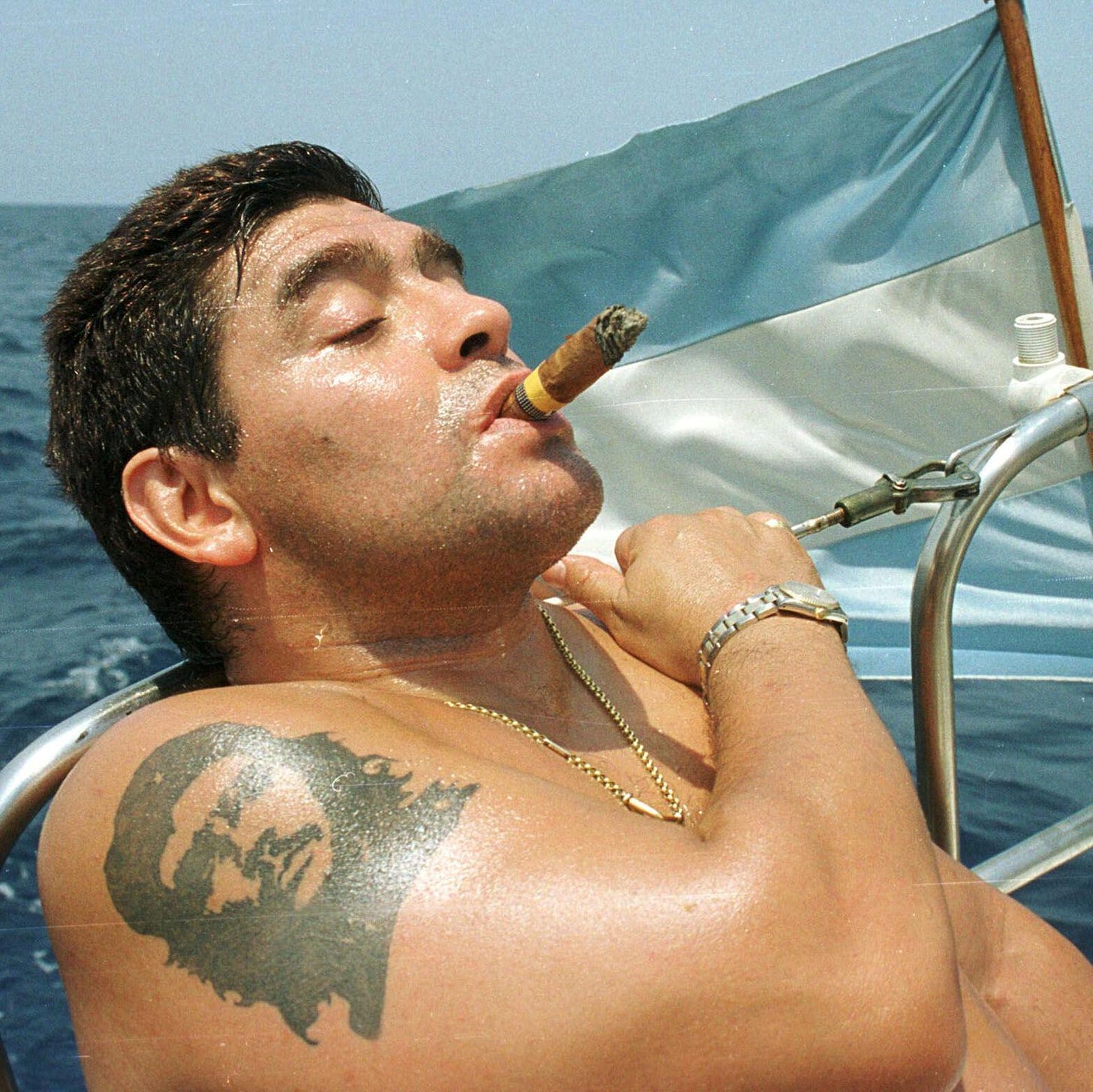 Argentine soccer star Diego Maradona smokes a Cohiba cigar as he rides a  sail boat in waters off Havana April 8. Maradona has been in Cuba since  January on a rehabilitation program