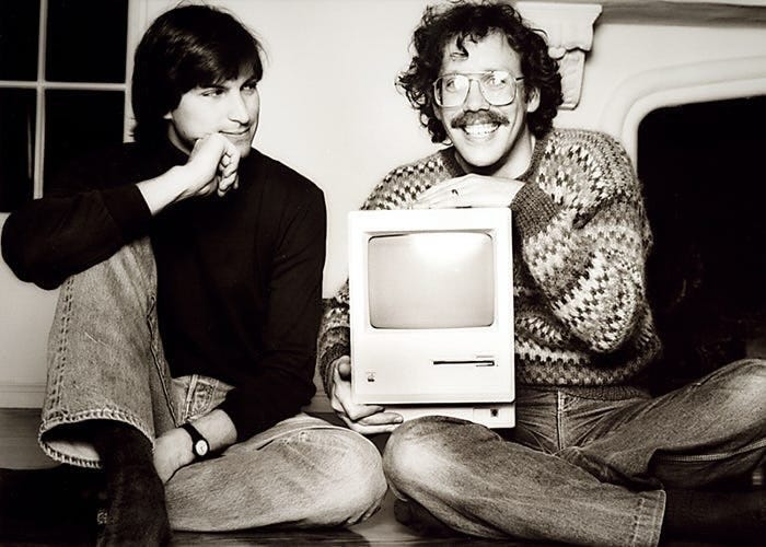 May be an image of 2 people, apple, computer, portable cassette player and text