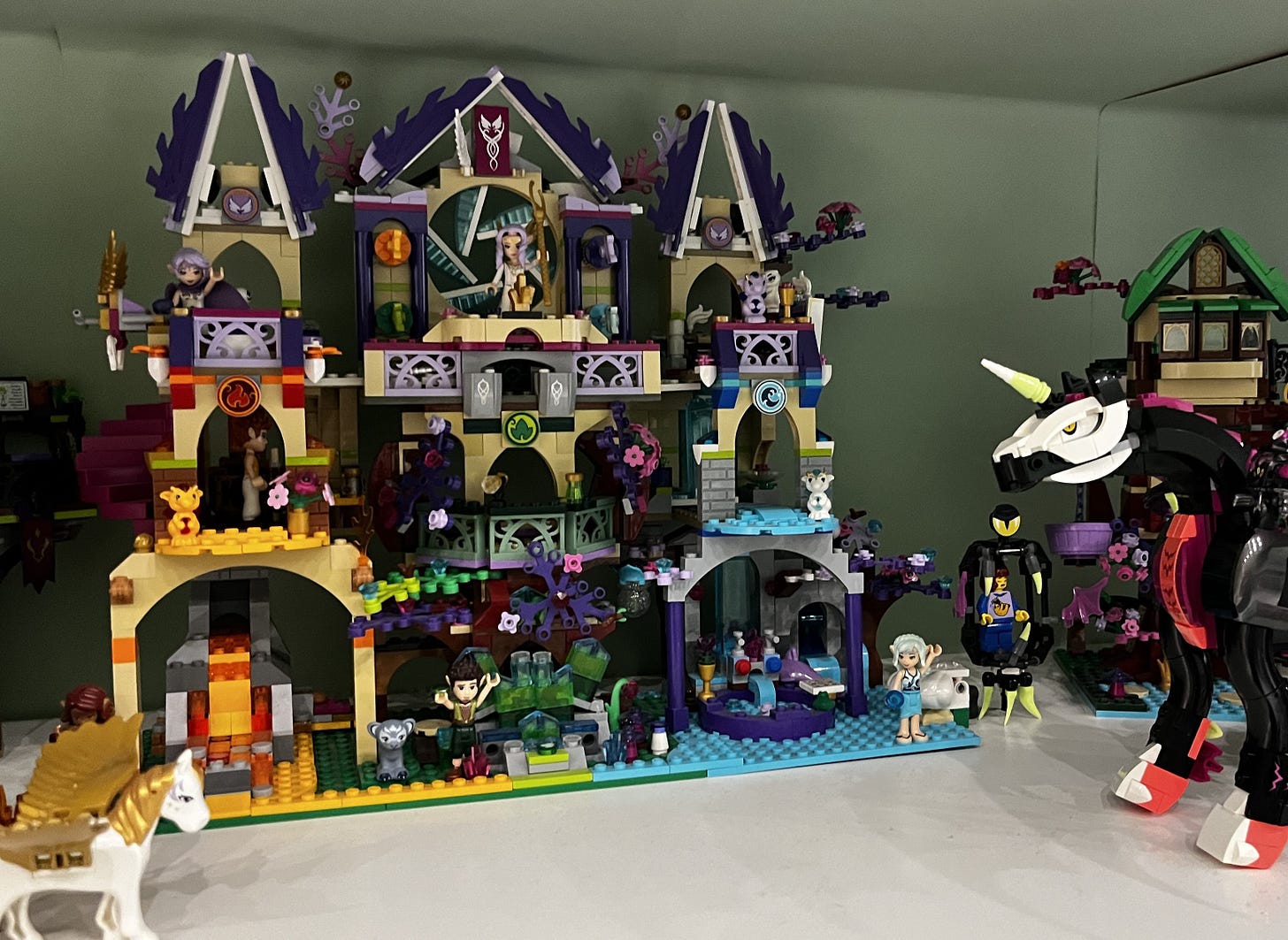 Lego Elves Castle on Three floors with a gothic unicorn in the corner