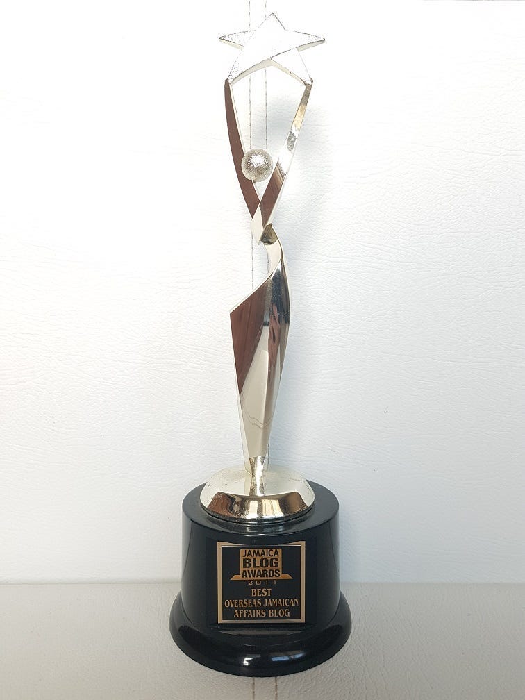 Jamaica blog awards association trophy for best Jamaica blog