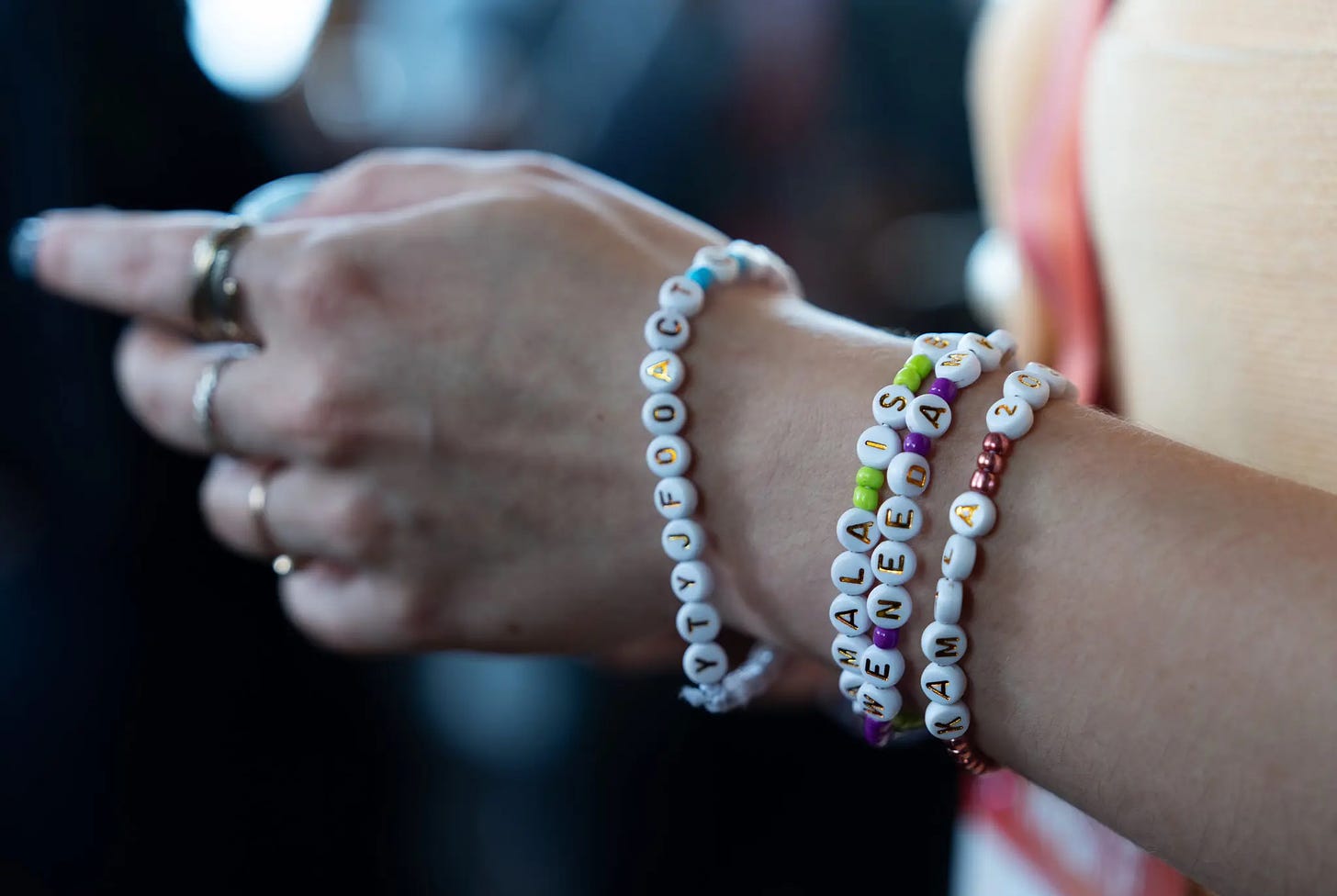 Todd Heisler/New York Times. One creator wore a friendship bracelet with the abbreviation YTYJFOACT for You think you just fell out of a coconut tree?