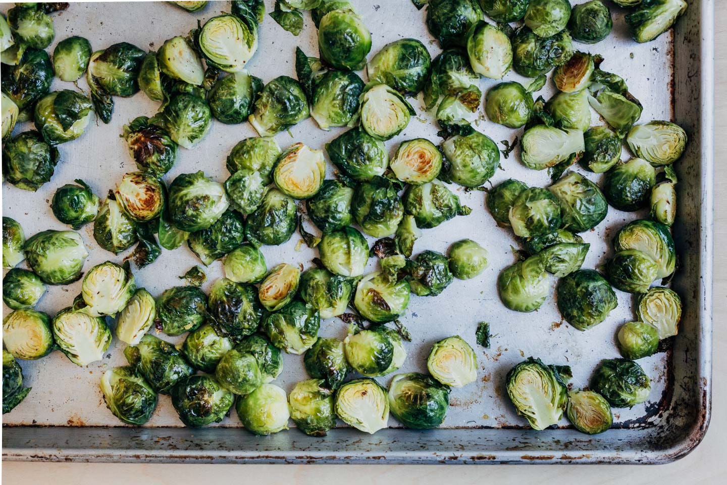 A sheet pan with roasted Brussels sprouts