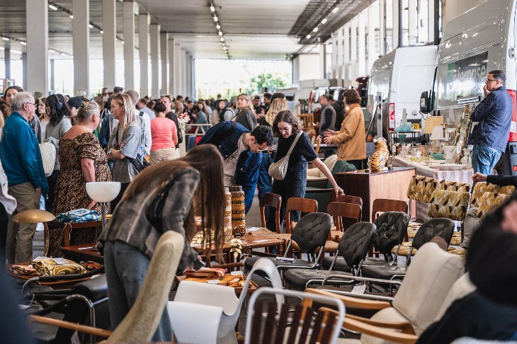 People rummaging at a flea market