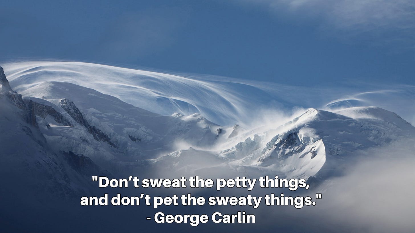 Swirling, huge snow drifts on a mountain top against a clear blue sky with this inset caption:   "Don’t sweat the petty things, and don’t pet the sweaty things." - George Carlin