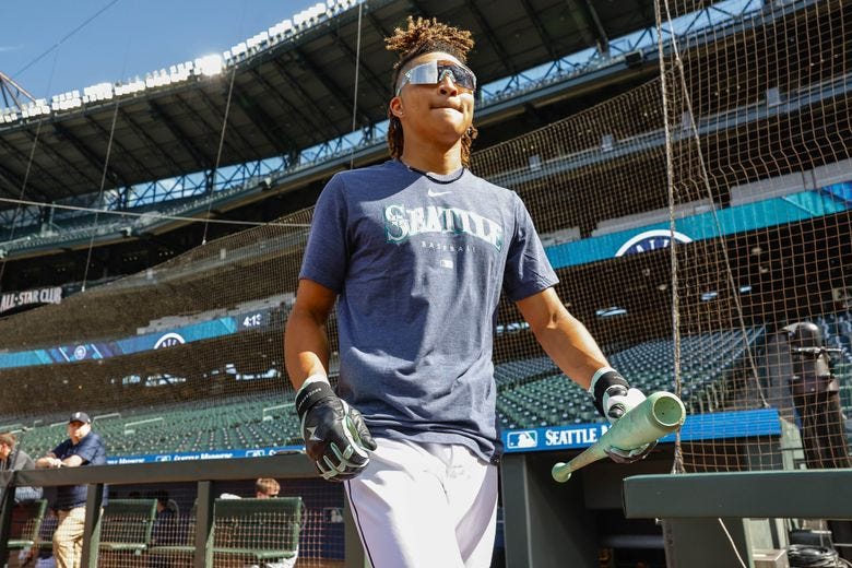 Mariners draft pick Tai Peet takes his cuts in the batting cage Tuesday at T-Mobile Park.  (Dean Rutz / The Seattle Times)