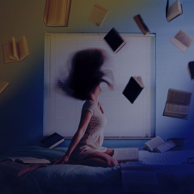 woman and books at night