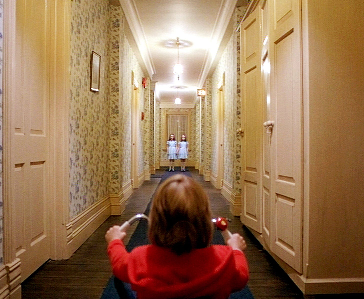 Image may contain Flooring Human Person Floor Corridor Interior Design Indoors and Wood