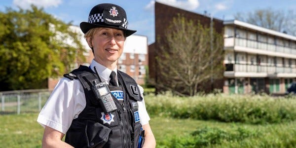 Assistant Chief Constable Rachel Nolan pictured in uniform outside with flats and park in the background