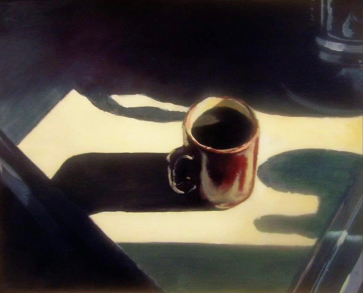 A dark brown coffee cup sits alone on a sunlit table surrounded by shadows