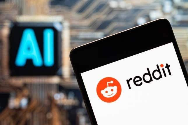 Reddit logo seen displayed on a smartphone with an Artificial intelligence (AI) chip and symbol in the background