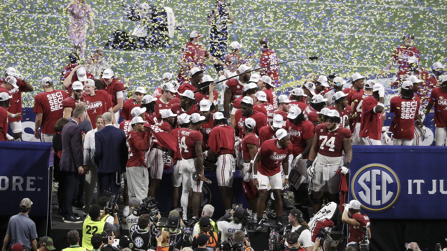 The University of Alabama football team celebrates against Georgia at Mercedes-Benz Stadium in Atlanta, GA on Saturday, Dec 2, 2023. 