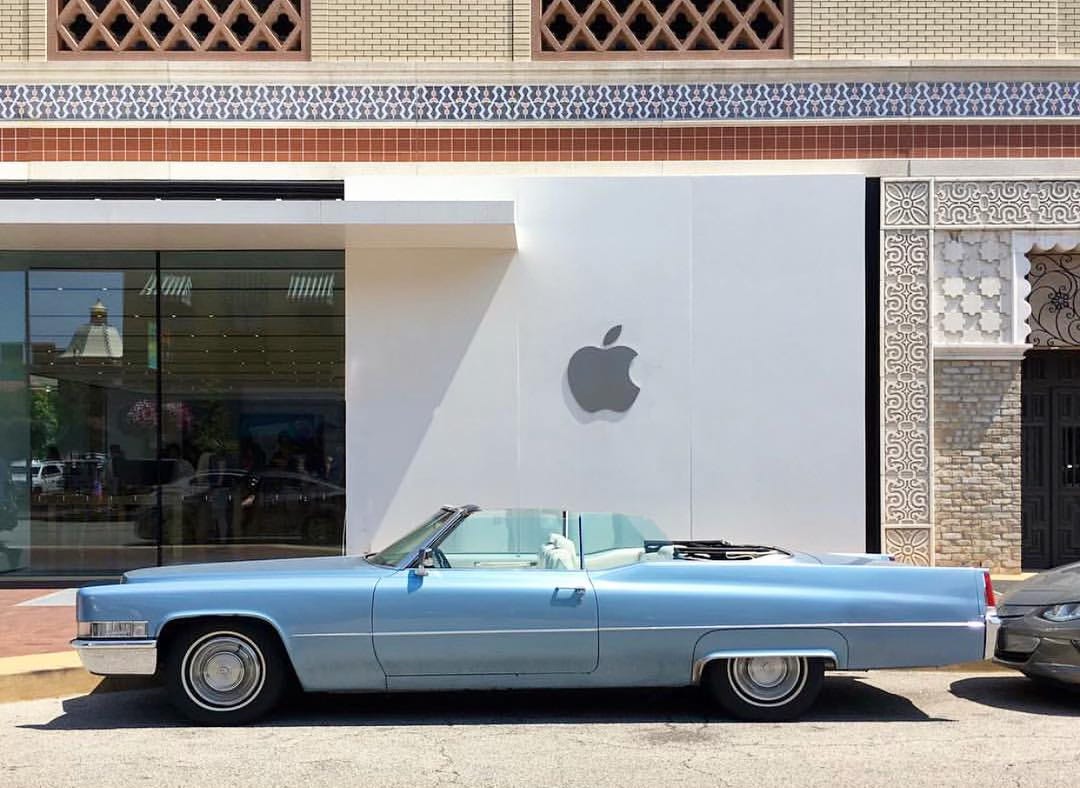 "We park out front." A 1960s convertible is parked in front of Apple Country Club Plaza. I drove to Kansas City because of this photo.